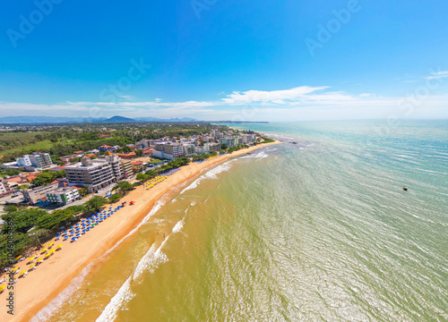 Imagem aérea da praia de Castelhanos em um dia ensolarado. Areias brancas, mar calmo e piscinas naturais. photo