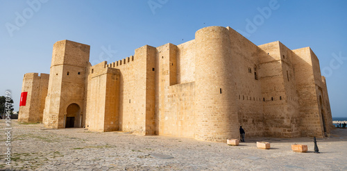 Ribat Hartema Fortress - one of main attractions of Monastir. Powerful defensive structure protecting city from enemies from sea. Beautiful side view photo