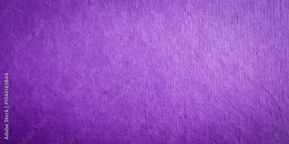 Fototapeta premium A close-up of a textured purple surface with a subtle gradient effect, showcasing the delicate fibers and fine grain of the material.