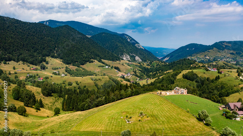 Aerial View of Majestic Mountains and Expansive Sky in Romania