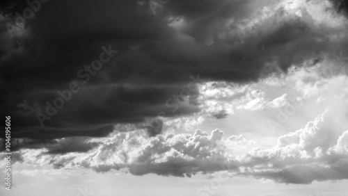 Dark rain clouds gathering for a storm, creating a dramatic and moody scene.