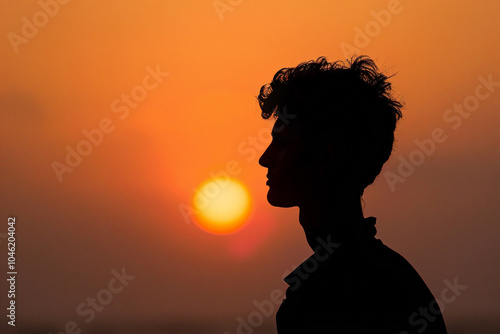 silhouette of a man in sunset