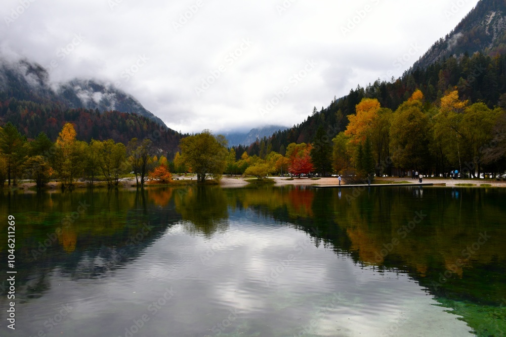 Fototapeta premium View of lake Jasna ain autumn with a reflection in the water near Kranjska Gora, Slovenia