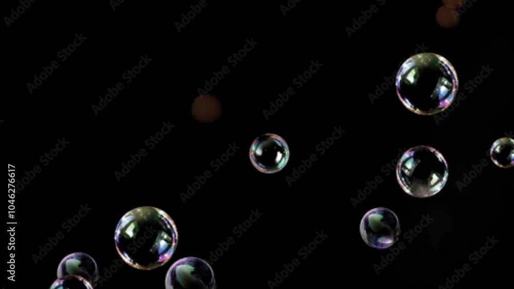 Air bubbles rising from the bottom on a dark background Air bubbles rising from the bottom on a dark background