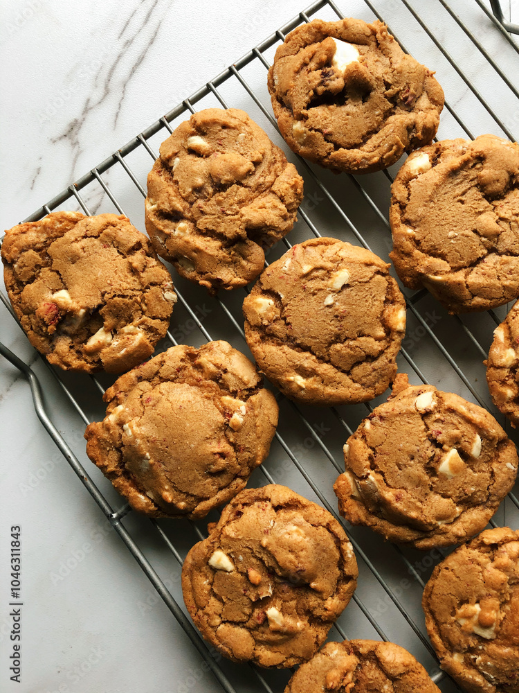 Warm Golden Cookies on a Cooling Rack – The Perfect Homemade Treat Warm Golden Cookies on a Cooling Rack – The Perfect Homemade Treat