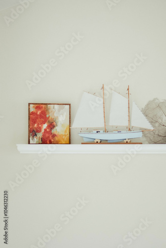Charming Small Painting on a Shelf: A Touch of Artistry in Home Decor