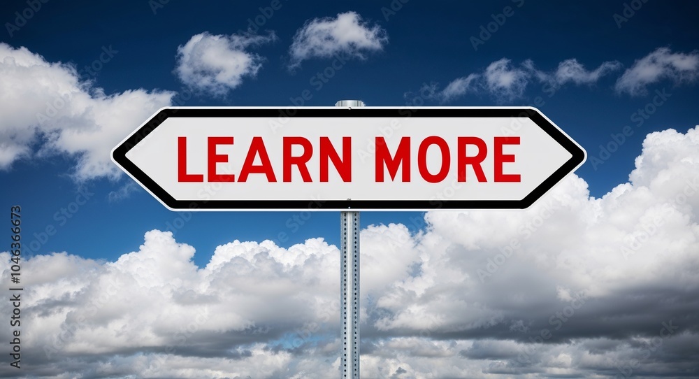Fototapeta premium Learn More text on road sign with clouds and sky background