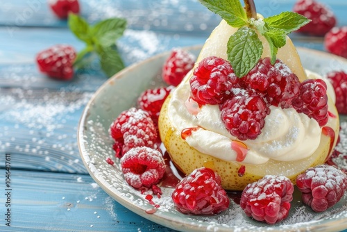 Baked pear dessert with cream raspberry syrup fresh raspberries and mint leaves on blue wooden background Close up