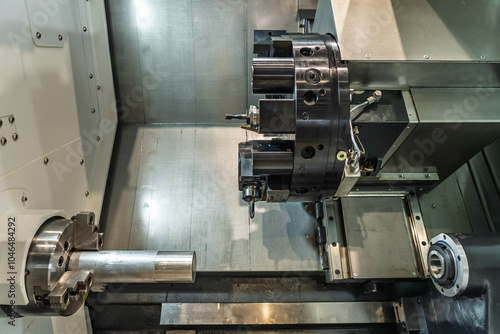 Inside view of a cnc machine. CNC lathe interior.Cnc machine. The CNC lathe machine or Turning machine. Turning numerical control machine with tools and chuck.