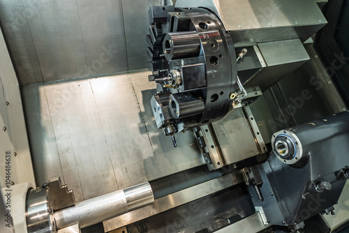 Inside view of a cnc machine. CNC lathe interior.Cnc machine. The CNC lathe machine or Turning machine. Turning numerical control machine with tools and chuck.