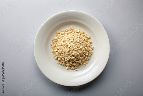 white plate oatmeal isolated on gray background Wide-Angle