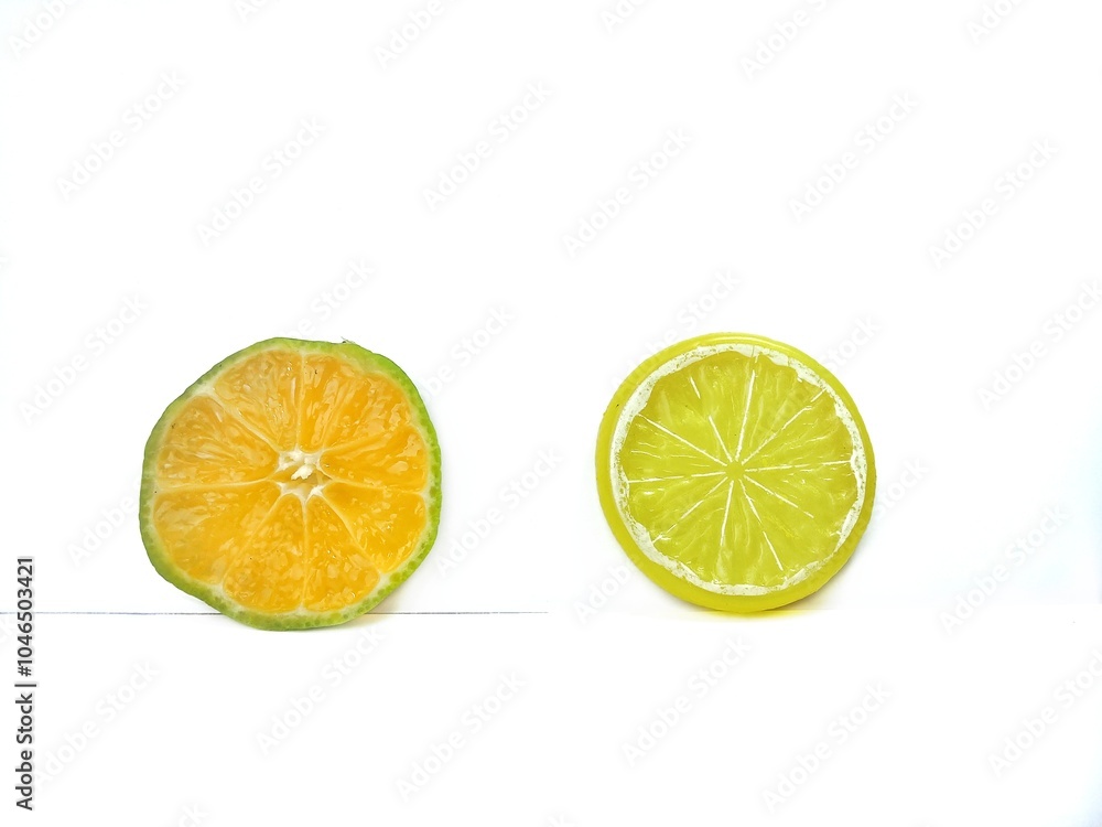 Lemon isolated.2 Round slice of ripe lemon on a white background. Fresh fruits with copy space Lemon isolated.2 Round slice of ripe lemon on a white background. Fresh fruits with copy space