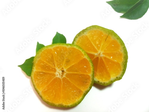 Lemon isolated. 2 Round slice of ripe lemon with leaves on a white background. Fresh fruits. photo