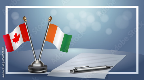 Canada and Cote D'Ivoire Small national flag on bokeh background, cooperative relationship