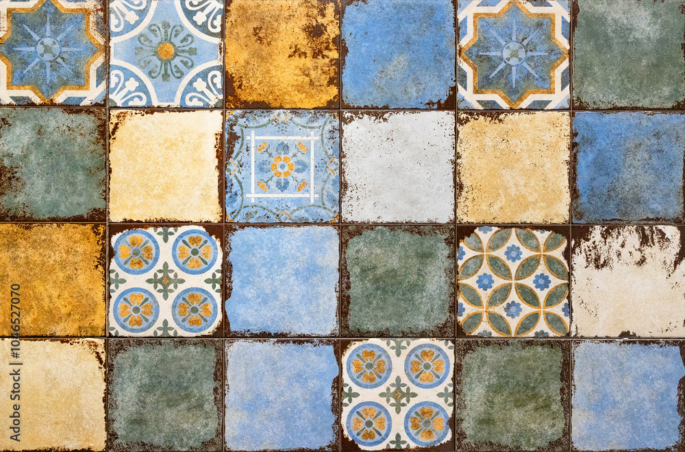Background of multi-colored aged ceramic tiles.