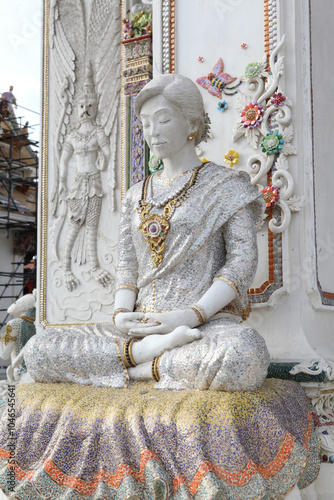 Detail, statue of Wat Pariwat (Beckham's temple) in Bangkok city, Thailand. Religious traditional national Thai architecture. Landmark, sight, architectural monument of Bangkok, Thailand. Asian temple photo