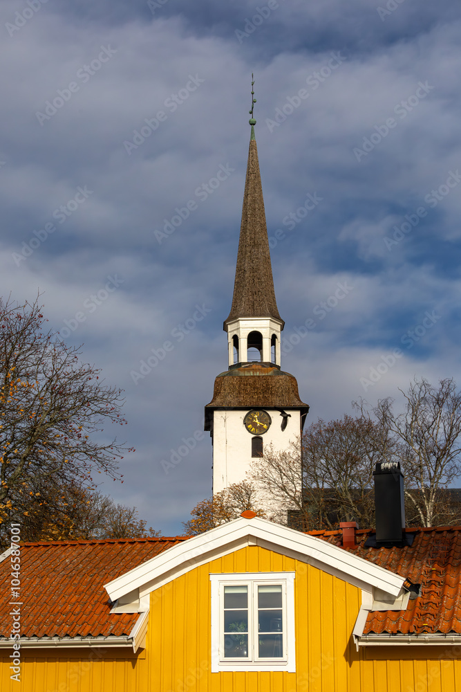 Mariefred, Sweden A view of the Mariefred Church and old traditional wooden buildings. Mariefred, Sweden A view of the Mariefred Church and old traditional wooden buildings.