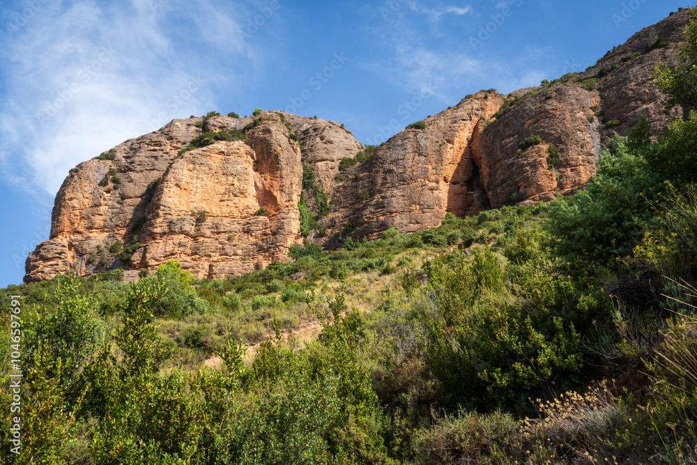 The Cliffs and Landscape of Agüero, in the province of Huesca, Aragon, Spain The Cliffs and Landscape of Agüero, in the province of Huesca, Aragon, Spain