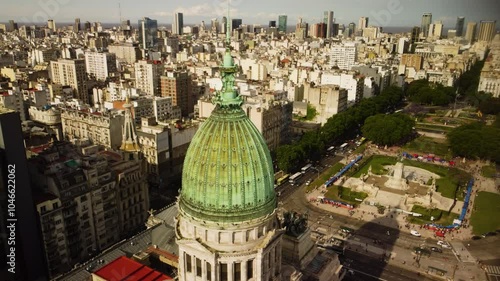 A dome of a national congress palace of Argentina, Buenos Aires, drone view, a fair in the park on a background