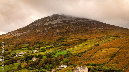 Mount Errigal in Donegal Ireland - The Misty Mountain Landscape has charming cottages in the beautiful countryside of Ireland