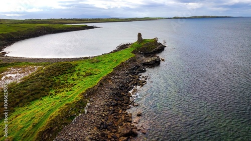 St John s Point in Donegal at the west coast of Ireland - a breathtaking coastal view showcasing a historic ruin that stands proud by the sea