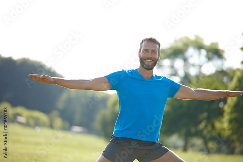 Park, man and smile with stretching for fitness, exercise and workout in Germany. Male person, outdoor and happy or satisfied on portrait at forest for self care, health and wellness as routine