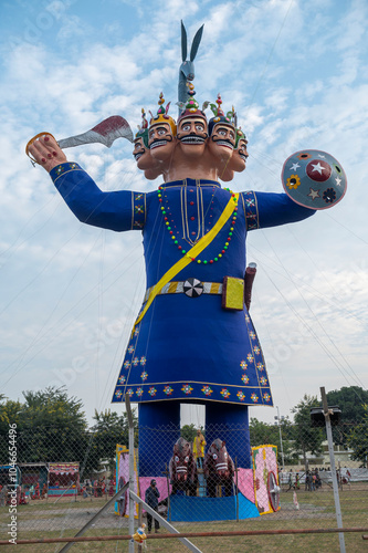 Katni , India - 12 October 2024 People have gathered to see the huge effigy of Ravana during Ravana Dahan at Kymore in Katni Madhya Pradesh India photo