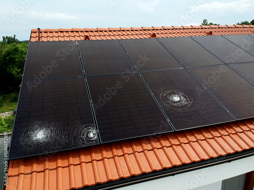 Three big dents from hail on a new solar power plant