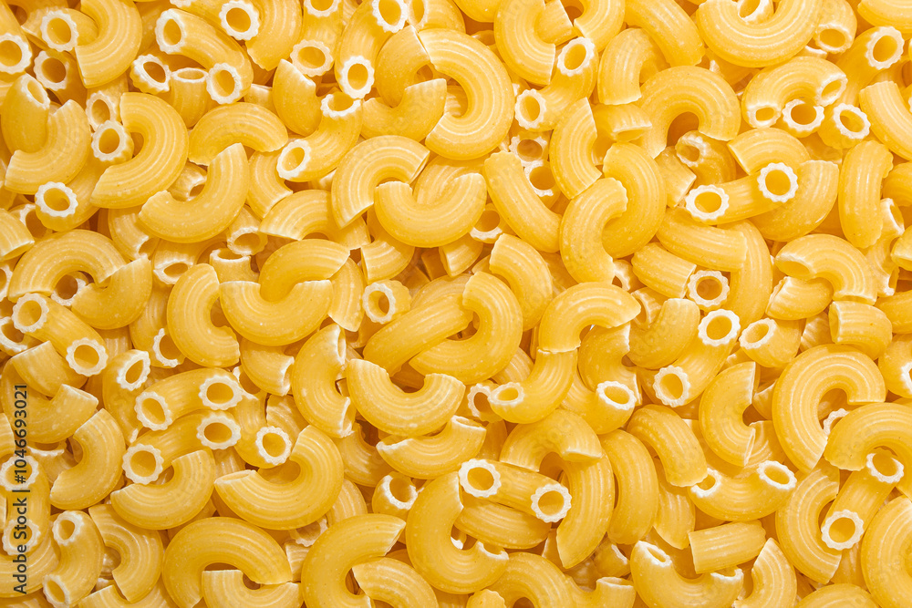 Uncooked Chifferi Rigati Pasta: A Culinary Canvas of Chifferi Rigati, Creating a Lively and Textured Background for Gourmet Cooking. Dry Pasta. Raw Macaroni - Top View, Flat Lay Uncooked Chifferi Rigati Pasta: A Culinary Canvas of Chifferi Rigati, Creating a Lively and Textured Background for Gourmet Cooking. Dry Pasta. Raw Macaroni - Top View, Flat Lay