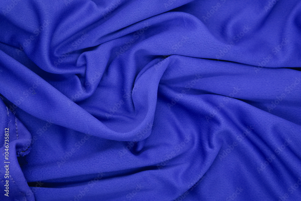 Abstract texture a wrinkled navy blue blanket Abstract texture a wrinkled navy blue blanket