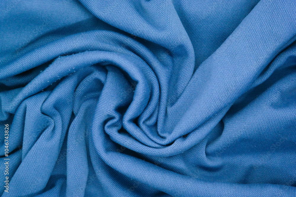 Abstract texture a wrinkled soft blue blanket Abstract texture a wrinkled soft blue blanket