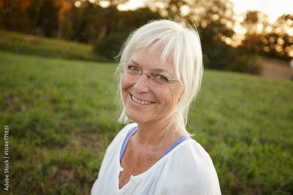 Smile, happy and portrait of senior woman with confidence for retirement, vacation and outdoor exploring. Nature, mature person and relax in New York park for holiday, tourism and health or wellness Smile, happy and portrait of senior woman with confidence for retirement, vacation and outdoor exploring. Nature, mature person and relax in New York park for holiday, tourism and health or wellness