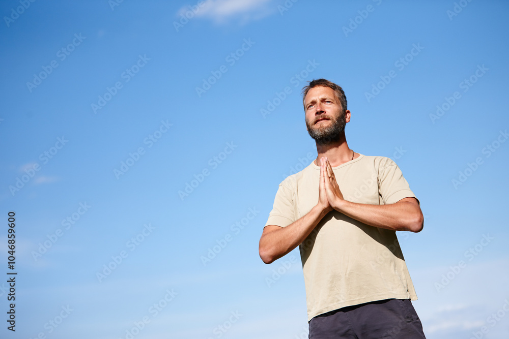 Yoga, outdoor and mature man with namaste for breathing exercise, meditation or fitness. Prayer hands pose, yogi and calm for spiritual health, body wellness or relax for peace by mockup space on sky Yoga, outdoor and mature man with namaste for breathing exercise, meditation or fitness. Prayer hands pose, yogi and calm for spiritual health, body wellness or relax for peace by mockup space on sky