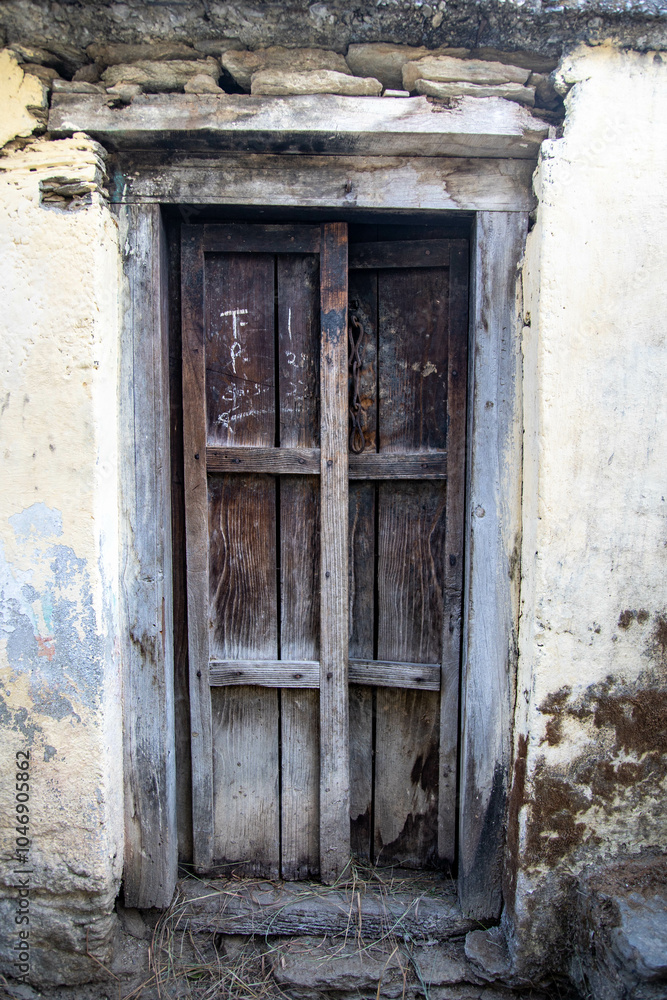 old wooden door of the house in small village of India, Uttarakhand old wooden door of the house in small village of India, Uttarakhand