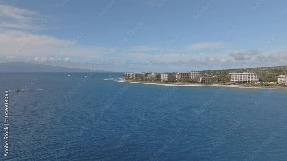 Hotels and resorts line the scenic coastline in West Maui, Hawaii. Hotels and resorts line the scenic coastline in West Maui, Hawaii.