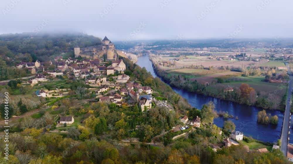 Wide aerial view of Castelnaud-la-chapelle, medieval village in Dordogne with unique castel Wide aerial view of Castelnaud-la-chapelle, medieval village in Dordogne with unique castel