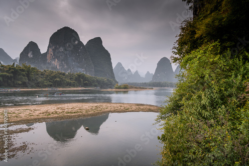 Beautiful Li river bamboo side Karst mountain landscape in Yangshuo Guilin, China photo