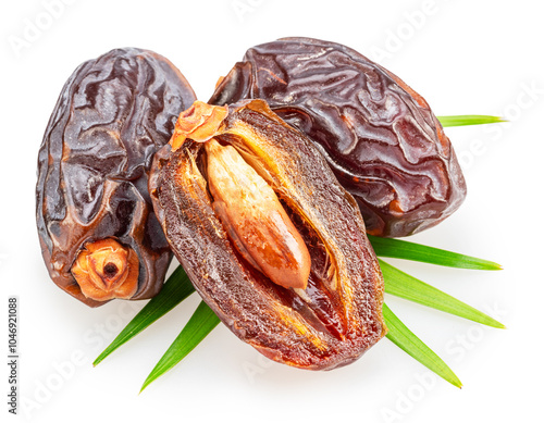 Ripe dry or soft dates palm fruit isolated on white background. File contains clipping path. photo