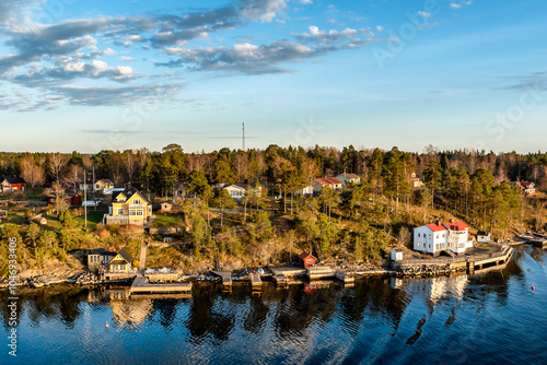 Fotografija View of the islands in the archipelago of Stockholm at a beautiful sunny day sunset