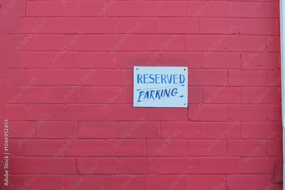 Fototapeta premium no parking sign on brick wall