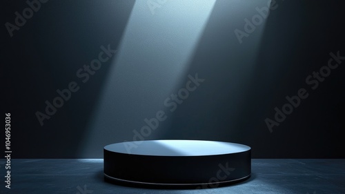 Circular Black Pedestal Under Spotlight on Dark Background