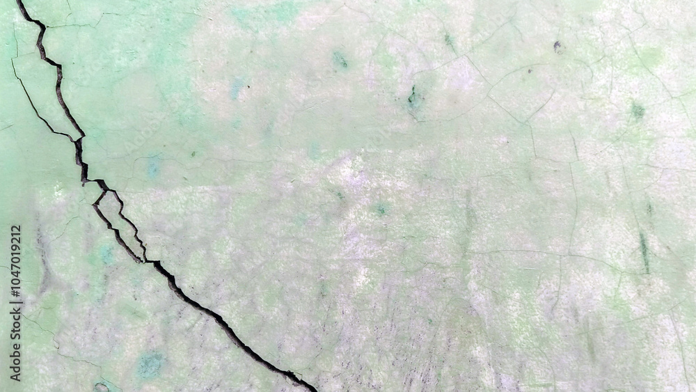 Fototapeta premium Cracked walls and faded paint