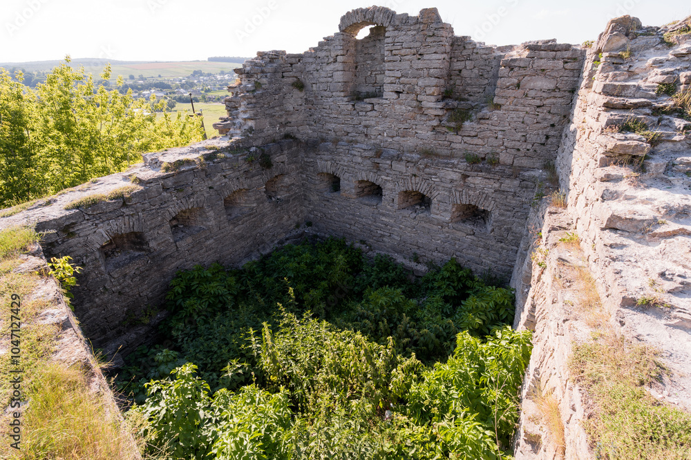 Ancient Ruins Overgrown with Vegetation in a Scenic Landscape Ancient Ruins Overgrown with Vegetation in a Scenic Landscape