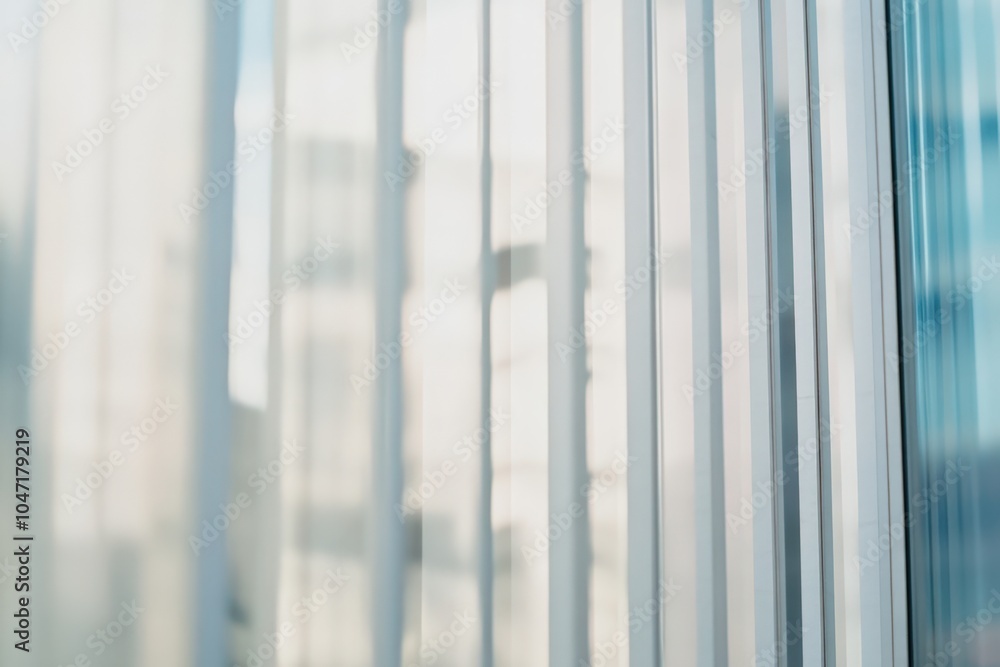 Blurred glass window with city skyline in the background Blurred glass window with city skyline in the background