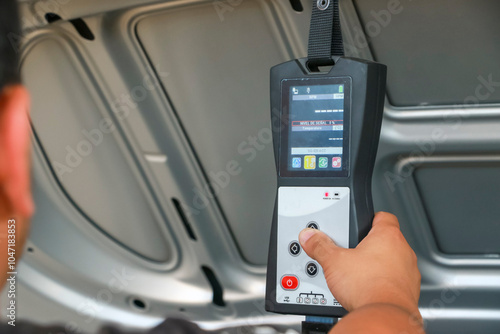 Man hand working with mechatronic equipment
