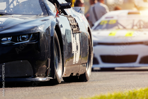Foto Back rear view Nascar Whelen euro series white racing sportscar car auto pit lane ready for race