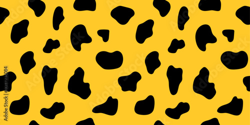 Seamless pattern with black spots on yellow background. Modern animal print. Leopard, jaguar design texture backdrop for textile, wrapping paper, fabric, cover, wallpaper. Vector
