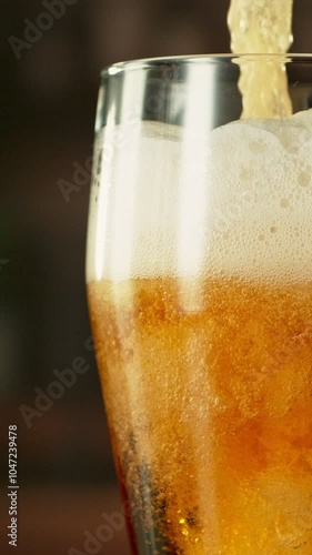 Wallpaper Mural Super Slow Motion of Pouring Beer into Pint. Filmed on High Speed Cinema Camera, 1000 fps. Vertical Aspect Ratio. Torontodigital.ca