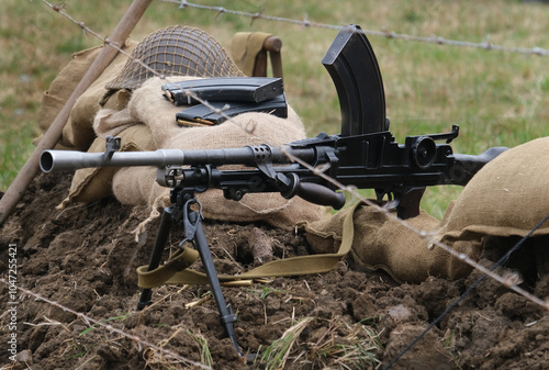  Acclaimed as one of the best light machine guns of World War II, the Bren appeared in four models that varied principally in barrel length and total weight. photo