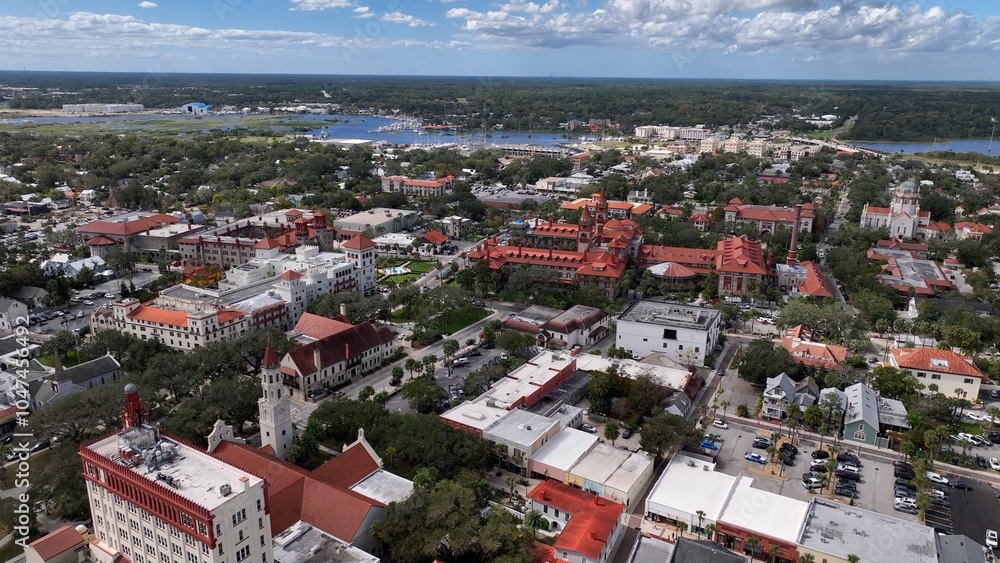 Fototapeta premium Downtown St Augustine Florida Aerial view of streets, shops, historic building and homes on a day of sunshine at this beach front historic city which is a tourist destination of families on vacation 